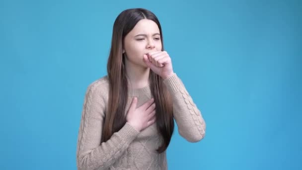 Teen kid suffer terrible cough covid pneumonia isolated blue color background — Video
