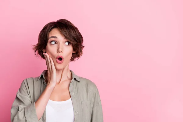 Photo of impressed young bob hairdo lady look promo wear outfit isolated on pink color background