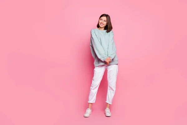 Full body photo of young pretty lady wonder look empty space modern outfit isolated over pink color background — Stock Photo, Image