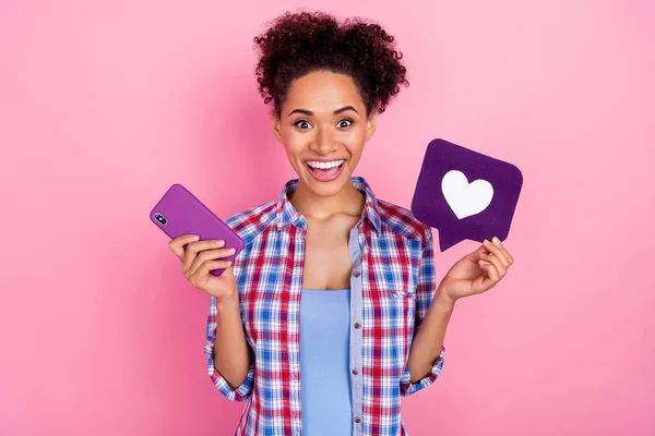Photo of millennial impressed volume hairdo lady show telephone like wear plaid shirt isolated on pink color background — Stock Photo, Image