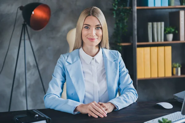 Portrait of positive lady company owner chief sit table listen applicant working background in loft workstation.