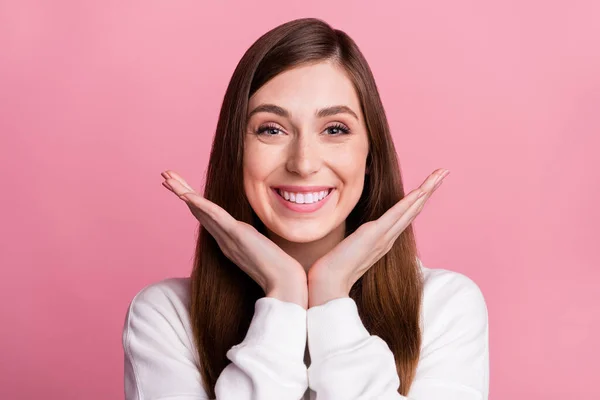 Photo of young woman happy positive toothy smile ceramic veneers clinic isolated over pink color background.