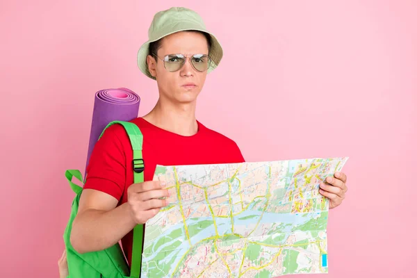 Photo Funny Doubtful Young Man Wear Red Shirt Headwear Holding — Stock Photo, Image