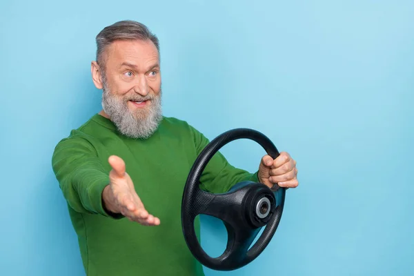 Photo of irritated aged man ride auto negative surprise violate rules wear pullover isolated blue color background.