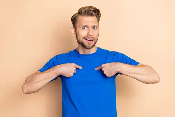 Portrait of shocked person indicate fingers self look camera isolated on beige color background.