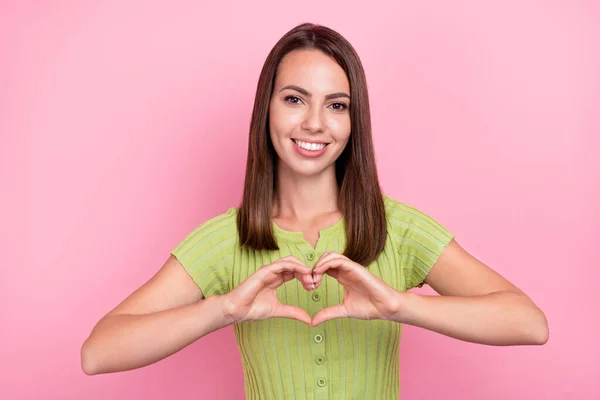 Photo of young lovely lady demonstrate fingers little heart symbol love feelings isolated over pink color background.