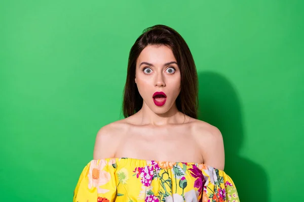 Photo of shocked pretty young person open mouth cant believe staring isolated on green color background.