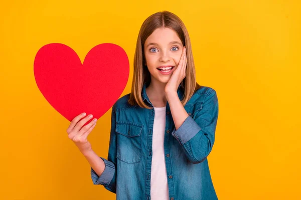 Portrait Excited Lovely Girl Hand Touch Cheek Hold Red Paper — Stockfoto