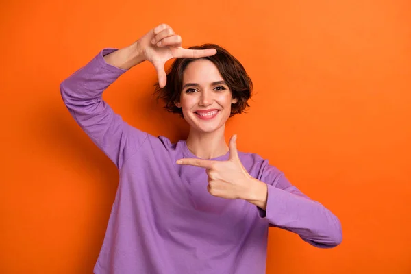 Portrait Positive Pretty Person Arms Fingers Demonstrate Cadre Isolated Orange — Fotografia de Stock