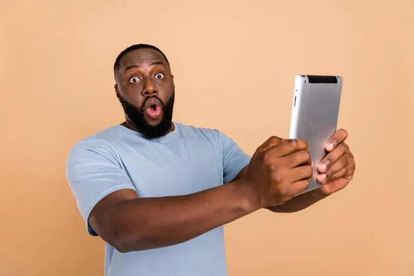 Photo Impressed Millennial Brunet Guy Look Tablet Wear Blue Outfit —  Fotos de Stock