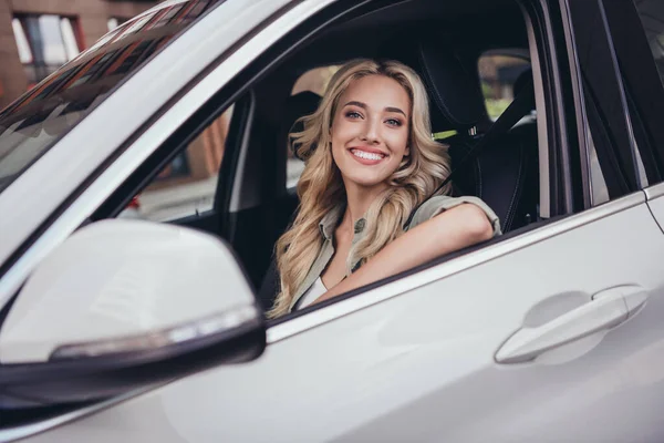 Photo Cheerful Pretty Lady Sitting Car Driver Seat Look Window — Zdjęcie stockowe