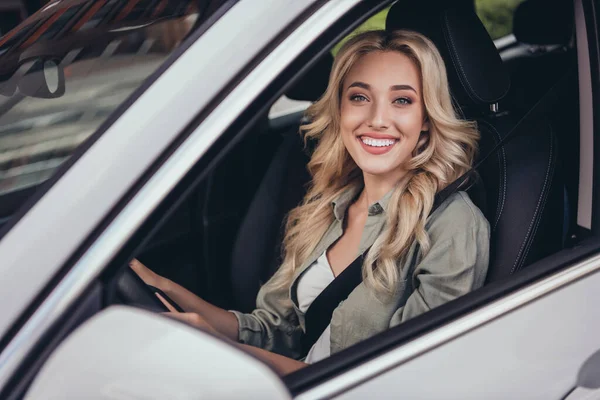 Photo Positive Gorgeous Lady Sitting Car Front Seat Hold Wheel — Zdjęcie stockowe