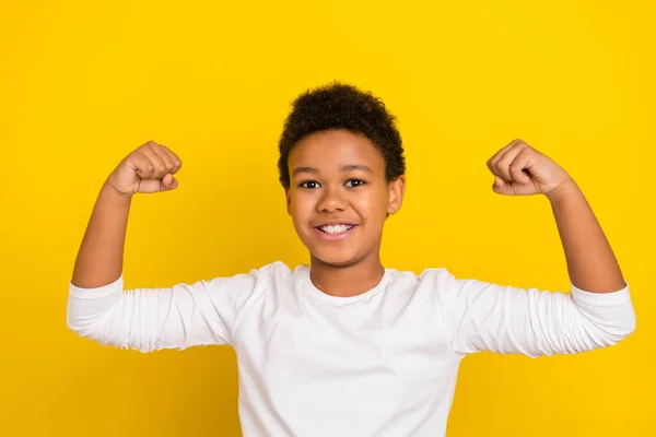 Portrait Positive Confident Pupil Arms Demonstrate Flexing Biceps Isolated Yellow — ストック写真