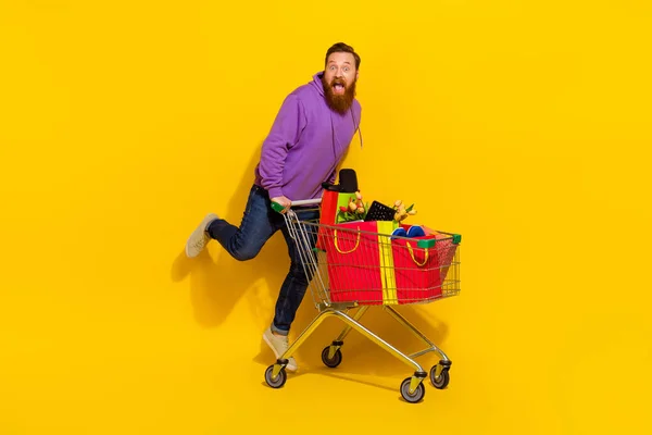 Full Size Photo Excited Overjoyed Person Jump Full Shopping Cart — Stockfoto