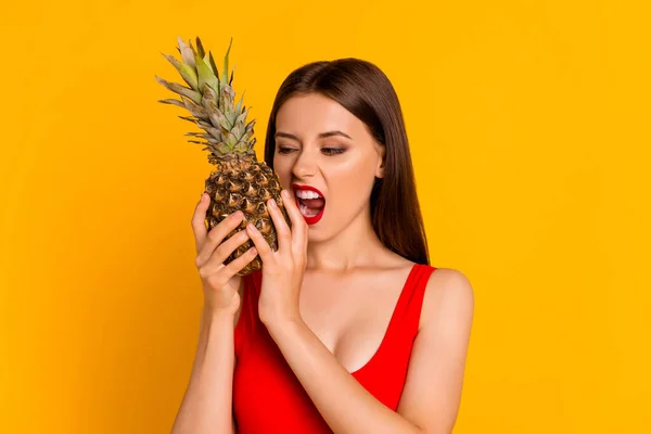 Photo Hungry Funny Lady Dressed Bodysuit Biting Fresh Pineapple Isolated — Stockfoto