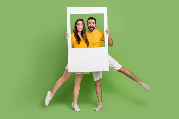 Full Length Portrait Two Excited Positive People Arms Hold Paper — Stockfoto