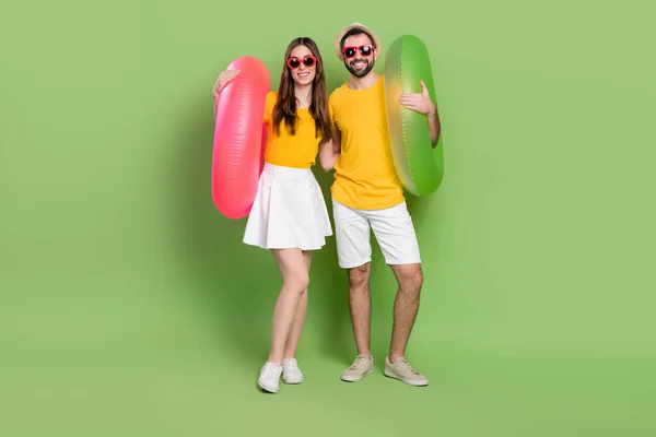Full Size Portrait Two Positive Partners Embrace Hands Hold Inflatable — Stock fotografie