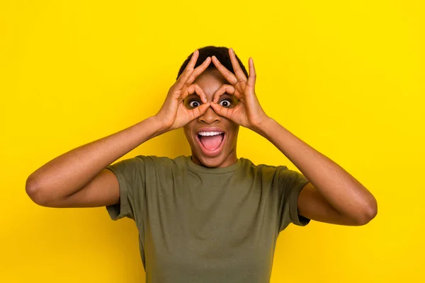 Portrait Carefree Funky Person Arms Fingers Make Binoculars Isolated Yellow — Stockfoto