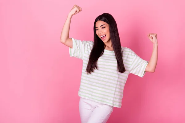 Photo Delighted Astonished Indonesian Girl Raise Fists Accomplishment Isolated Pink — Stockfoto