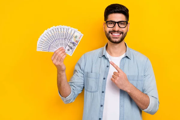 Photo Cheerful Guy Banker Hands Hold Cash Finger Point Usd — 스톡 사진