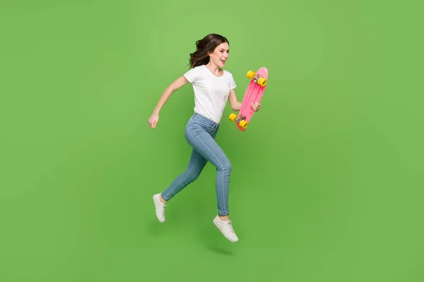 Photo Impressed Funky Young Lady Wear White Shirt Jumping Running — Foto de Stock