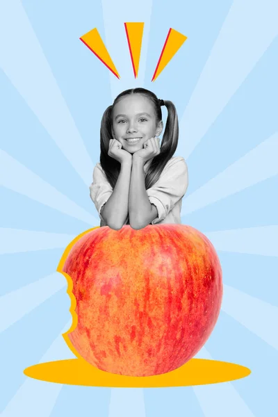 Vertical collage picture of positive girl black white effect behind huge apple isolated on painted blue background.