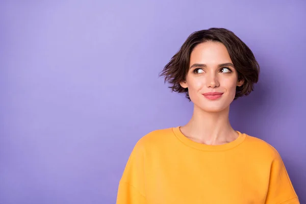 Photo of pretty positive minded person look interested empty space isolated on violet color background.