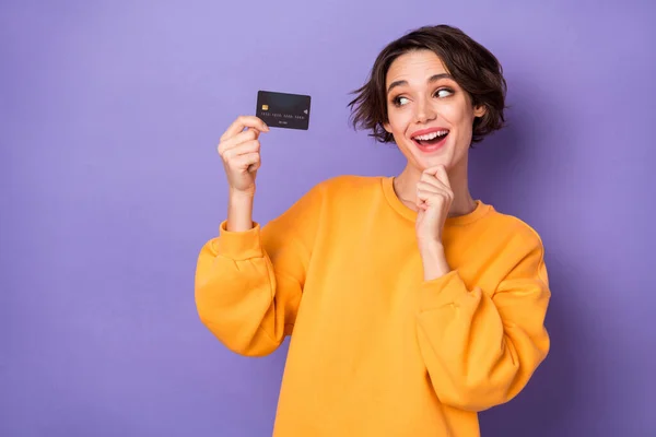 Portrait Attractive Cheerful Curious Girl Holding Hand Bank Card Deciding — Stockfoto