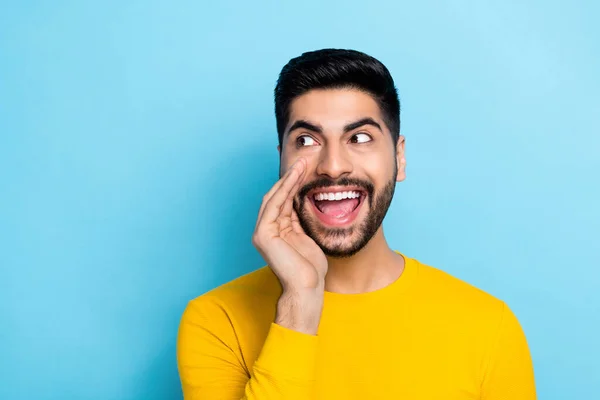 Photo Handsome Excited Man Wear Yellow Sweater Arm Mouth Looking — стоковое фото