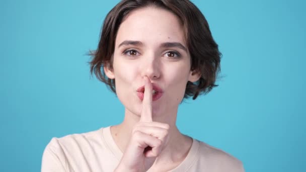 Sly Lady Make Shhh Symbol Finger Lips Isolated Blue Color — Vídeos de Stock