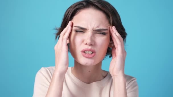 Frustrated Lady Suffer Severe Head Ache Isolated Blue Color Background — Αρχείο Βίντεο