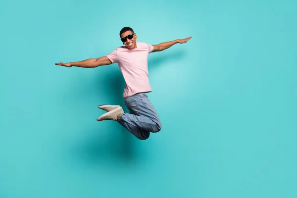 Full Length Photo Pretty Childish Guy Wear Pink Shirt Jumping — стоковое фото