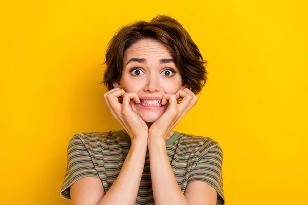 Photo Scared Horrified Lady Wear Striped Shirt Biting Fingers Isolated — Stock fotografie