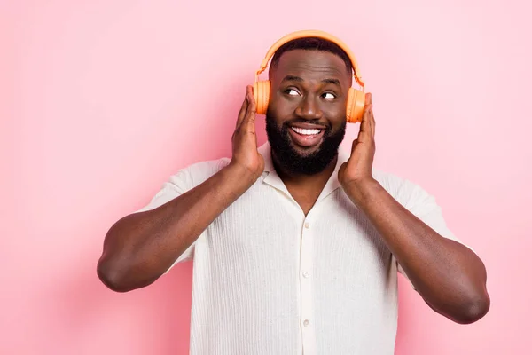 Portrait Cheerful Person Hands Touch Headphones Look Empty Space Isolated — Stockfoto