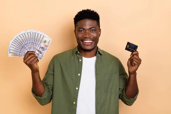 Photo Nice Millennial Brunet Guy Hold Money Card Wear Khaki — Stock fotografie