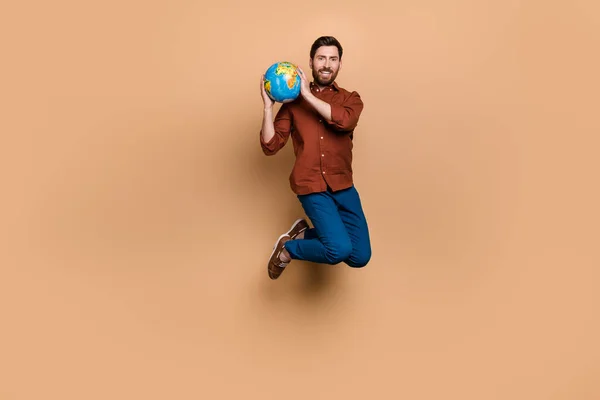 Full Length Photo Cheerful Excited Person Jumping Hands Hold Globe — Stock Photo, Image
