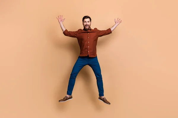 Full Size Photo Overjoyed Cheerful Person Jumping Raise Opened Hands — Stok fotoğraf