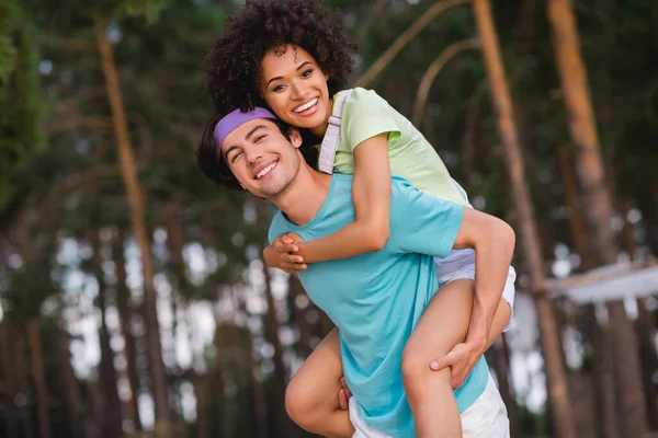 Photo Positive Funny Young Husband Wife Smiling Having Fun Together — Zdjęcie stockowe