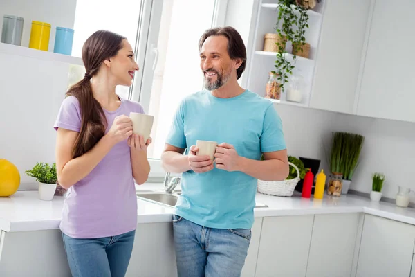 Photo Two Positive Peaceful People Hold Fresh Coffee Cup Communicate — Stockfoto