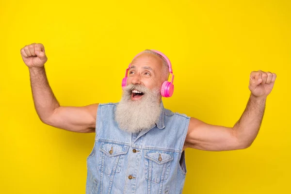 Photo Excited Cool Retired Guy Wear Jeans Waistcoat Listening Earphones — Stockfoto