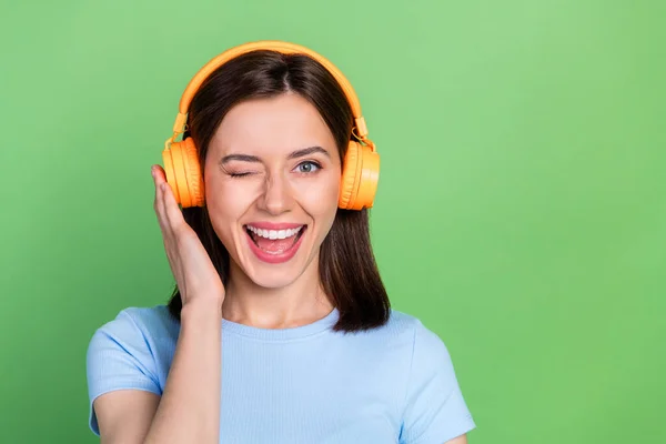 Portrait Adorable Cheerful Person Arm Touch Headphones Eye Wink Toothy — Stockfoto