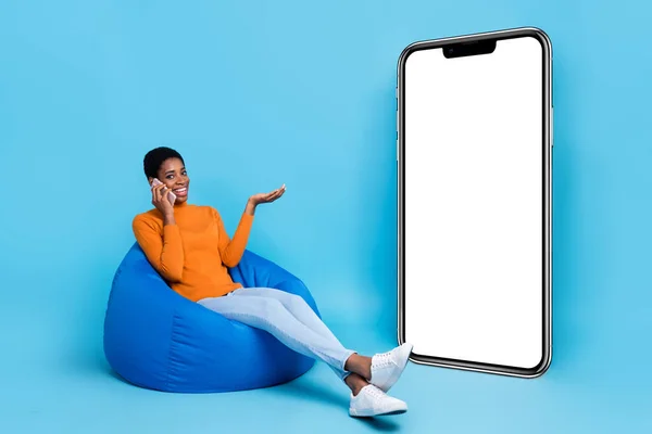 Photo Unisex Person Sit Bean Bag Enjoy Phone Conversation Poster — Fotografia de Stock