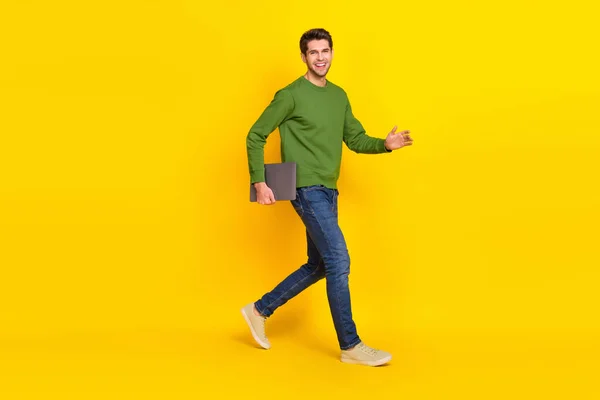 Photo Sweet Attractive Guy Dressed Green Pullover Walking Holding Modern — Stockfoto