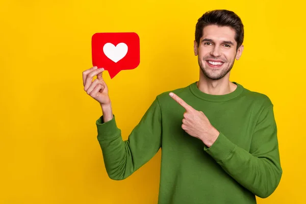 Photo Pretty Cute Young Guy Wear Green Sweater Pointing Finger — Fotografia de Stock