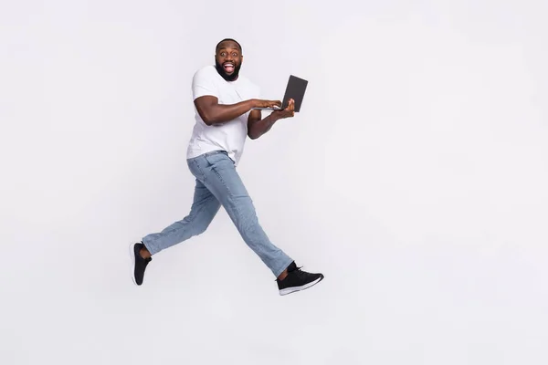 Photo Charming Positive Man Wear Casual Shirt Typing Modern Device — Stockfoto