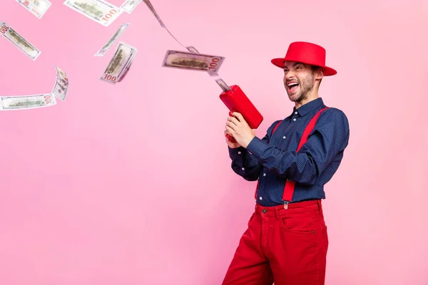 Portrait Funky Overjoyed Guy Use Money Gun Flying Bills Have — Zdjęcie stockowe