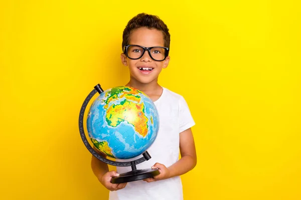 Photo Positive Cheerful Boy Student First Lesson Hold Globe Earth — Stock fotografie