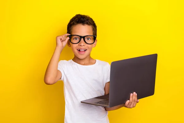 Photo Smart Clever Boy Arm Touch Spectacles Hold Netbook Enjoy — Stockfoto
