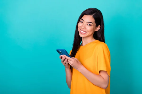 Photo Nice Brunette Lady Hold Telephone Wear Orange Shirt Isolated — 스톡 사진