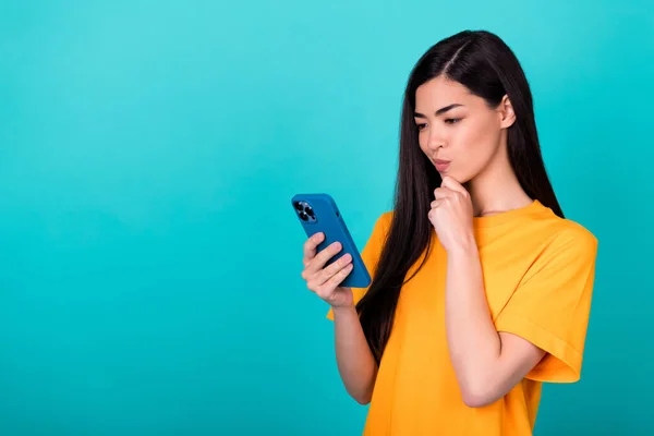 Photo Thinking Brunette Lady Look Telephone Wear Orange Shirt Isolated — 스톡 사진